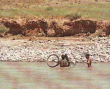 Afghanistan 1976 - Local people help cross Hari Rud River