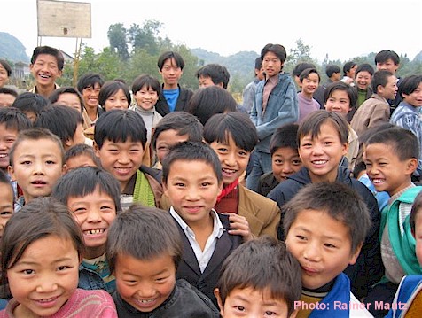 Chinese students greeting a traveler