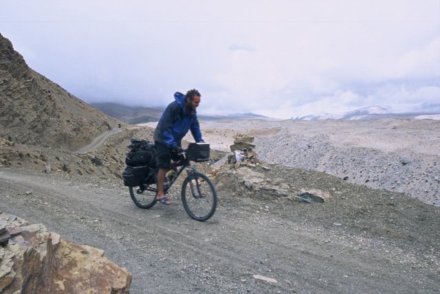 Awesome dry dirt hilly ride, with a straight drop off the side to a valley. Road into Tingri.