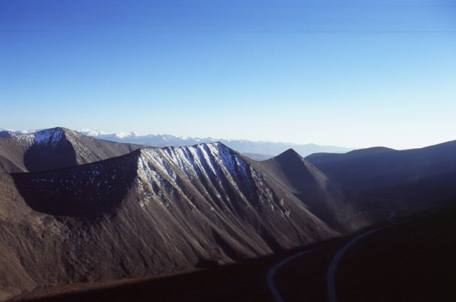 The view back south east towards the desert and the rest of China. Made Urumqi the next day, 115km and made my highest speed 62km/ph on the down hill. The 62kmph felt much safer the being confronted with the traffic of a big city again. Total trip was April - September, just over 6400km. About 4 or 5 weeks rest time within that period.